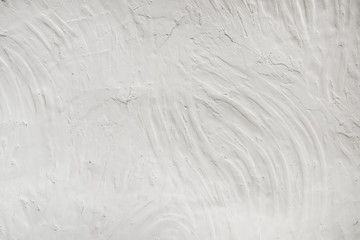 Rugged stucco white painted wall surface background