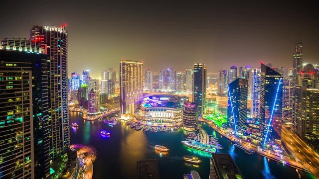 night light famous dubai marina mall water traffic panorama 4k time lapse uae
