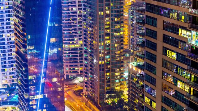 night light dubai marina apartment building window rooftop view 4k time lapse uae
