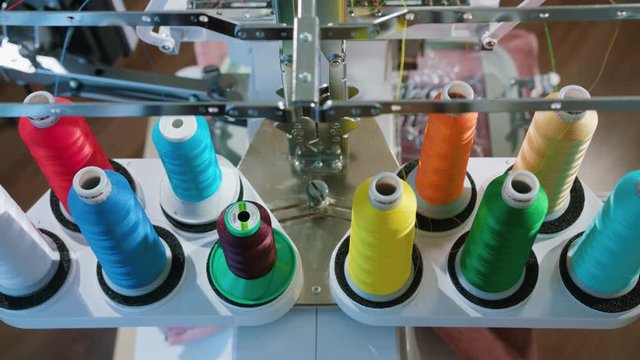 skein thread stand for embroidery machines during operation, the camera moves, frame from the top