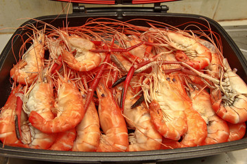 Ready streamed large fresh prawns  in pan.