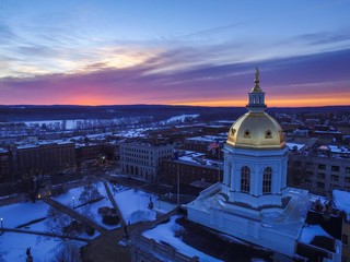 Fototapeta na wymiar Sunrise over New Hampshire Statehouse