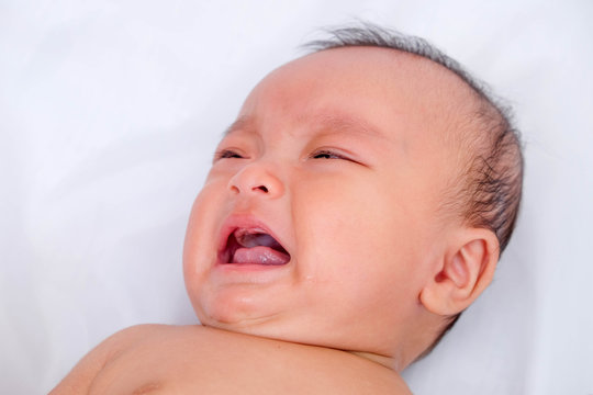 portrait of adorable baby boy cry asia thailand