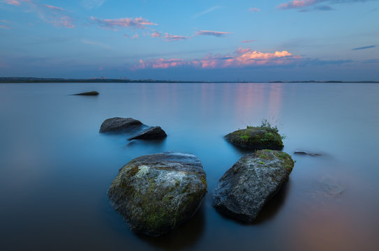 Meditative Landscape With Texture Stones In The Foreground And A Long Exposure With Infinite Horizon