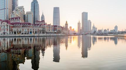 River And Modern Buildings Against Sky in Tianjin,China.