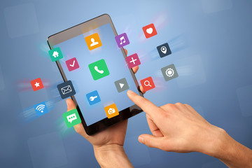 Female hand holding tablet