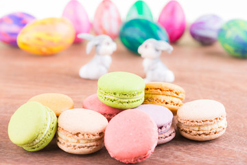 Fototapeta na wymiar Macarons with Easter egg and bunnies