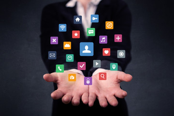 Woman holding colorful applications