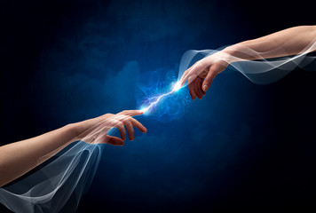 Hands connecting through fingers in space