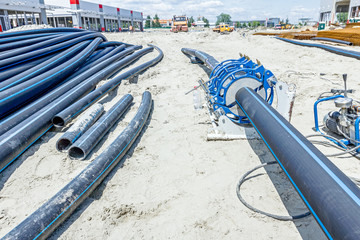 Hydraulic butt fusion welding machine at construction site plate for weld the connection HDPE pipe