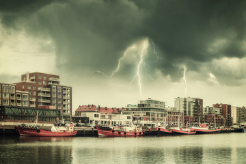 Obraz premium Vintage Landscape with Ships and Lightning