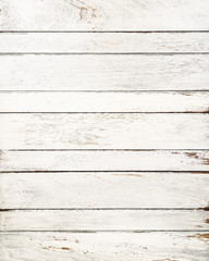 Vintage white wood background with peeling paint.