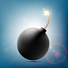 Round metal bomb with a burning fuse.