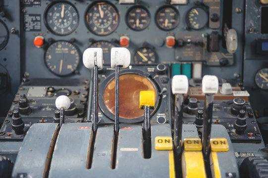Airplane Cockpit Equipment with indicators, buttons, and instruments.