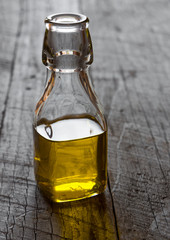 Olive oil with leaves and olives