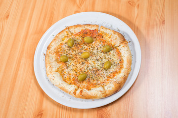 Cheese and olives pizza