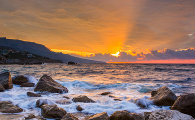 Gondolas moored by Saint Mark square with San Giorgio di Maggiore church in the background during twilight blue hour, Venice, Italia