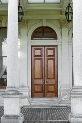 Fototapeta na wymiar Brown door and columns