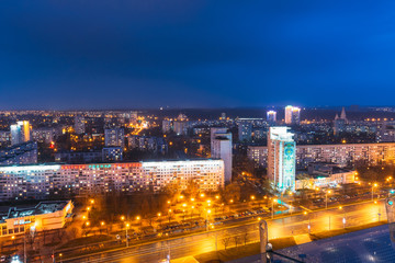 Fototapeta premium Minsk, Belarus. Aerial View Cityscape In Bright Blue Hour Evening