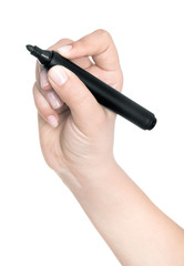 Hand writing on copy space. Beautiful female hand holding black marker pen . Brightly lit with backlight and isolated on white background.
