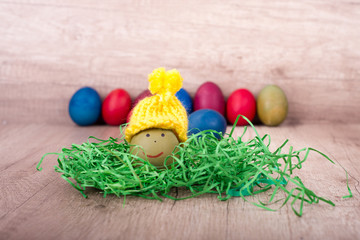 Fototapeta na wymiar Happy Easter, funny egg with a hat