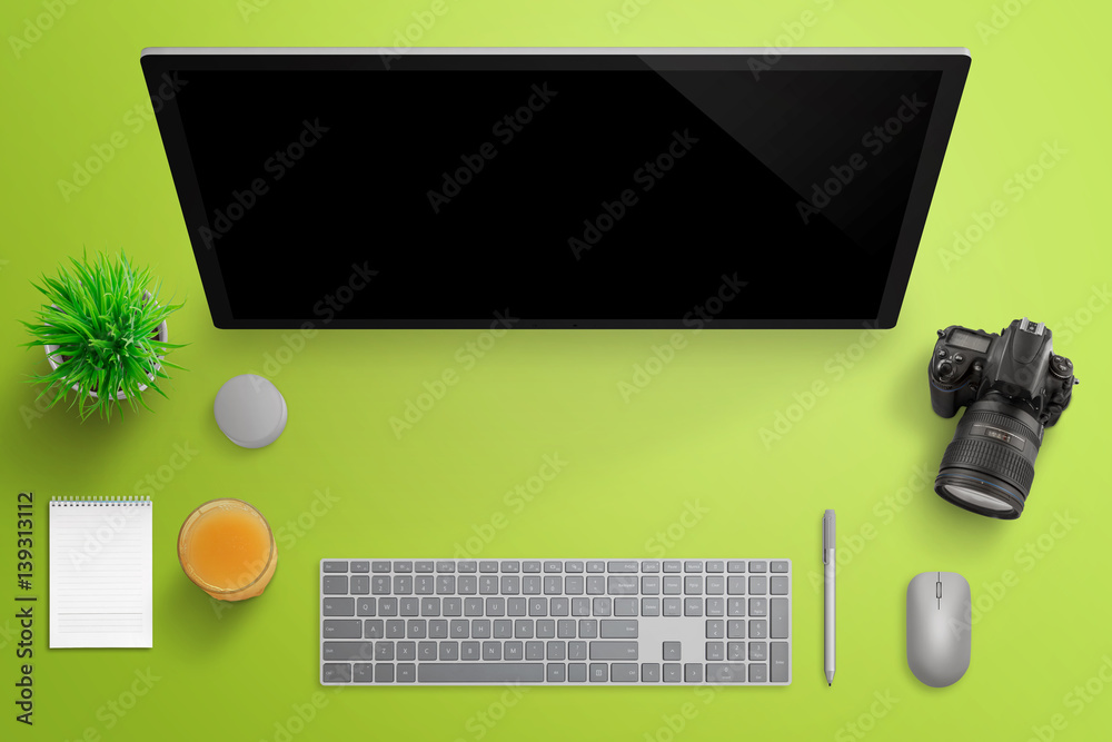 Poster photographer studio with big computer display. modern surface studio with keyboard, pen, mouse, and 