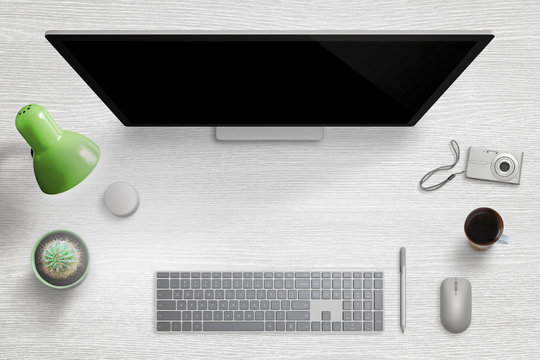 Modern home desk workplace. Computer display with keyboard, mouse, pen, dial, lamp, plant, cup of coffee and digital camera. Free space for hero header image text.