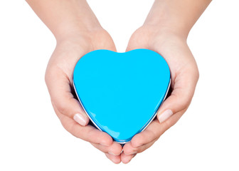 hands holding sweet little heart isolated on white background.