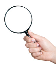 Female hand holding the magnifying glass isolated on white background
