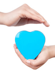 Obraz premium Woman hand making sign Heart isolated on white background