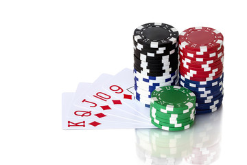 Cards to poker and colorful chips on white background