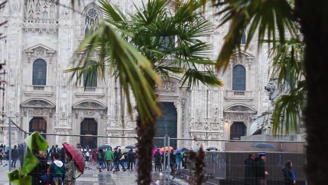 people in milan duomo with palm