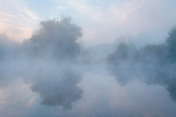 Beautiful misty sunrise river.