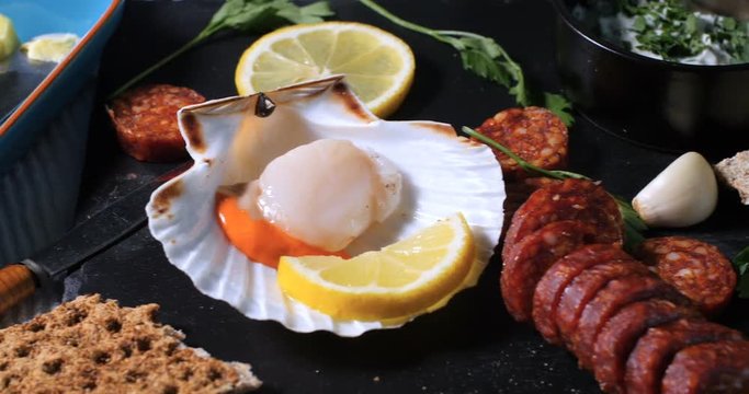 Dolly close up view of ingredients for scallops with chorizo in garlic mayonnaise