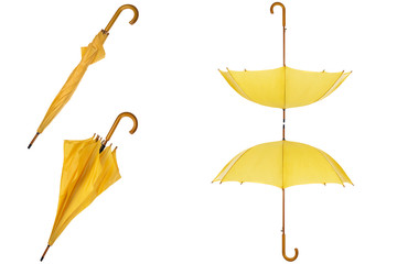 Set of yellow umbrellas isolated on white background