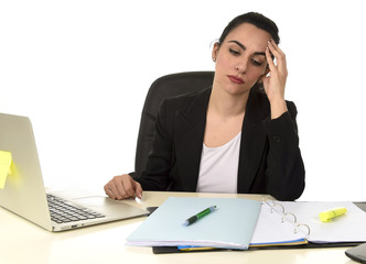 business woman working on laptop at office in stress suffering intense headache migraine