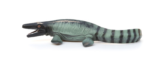 side view Mosasaurus toy with shadow on white background