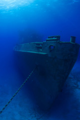 The bow of the USS Kittiwake shipwreck which sits in the warm shallow waters of Grand Cayman. The old submarine support vessel is now an underwater attraction for divers and snorkelers