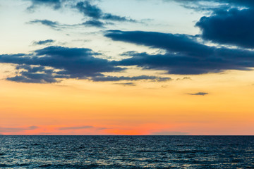 Sunset over the beach of ocean