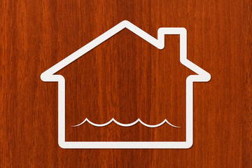 Paper house with water waves inside, abstract conceptual image