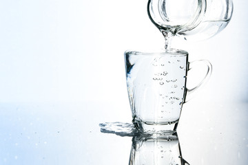 Pouring water in glass