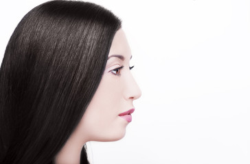 Naklejka premium Beauty Girl with Long Straight Black Healthy Hair. Beautiful Brunette Woman Portrait.