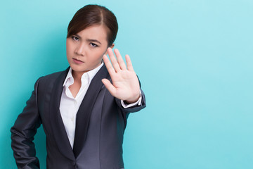 Business woman making stop symbol