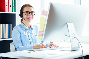 Close-up of woman working in a call center