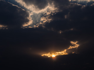 Fototapeta na wymiar Sun Through Clouds a Light Beam
