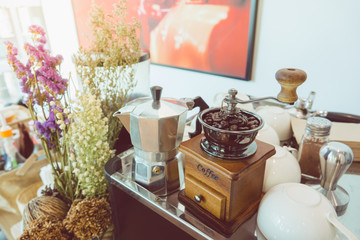 Coffee maker and coffee grinder in coffee shop