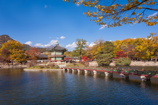 gyeongbokgung palace in autumn, lake with blue sky, Seoul, South Korea.