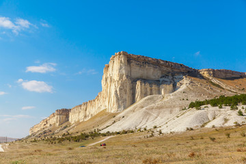 Fototapeta premium View of White rock or Aq Qaya on a Sunny summer day.