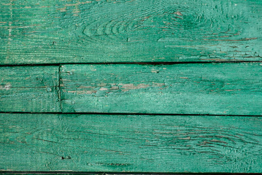 Turquoise old wooden background with cracks