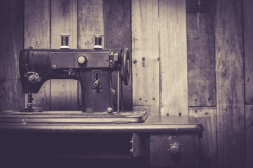 sewing machine with wooden background